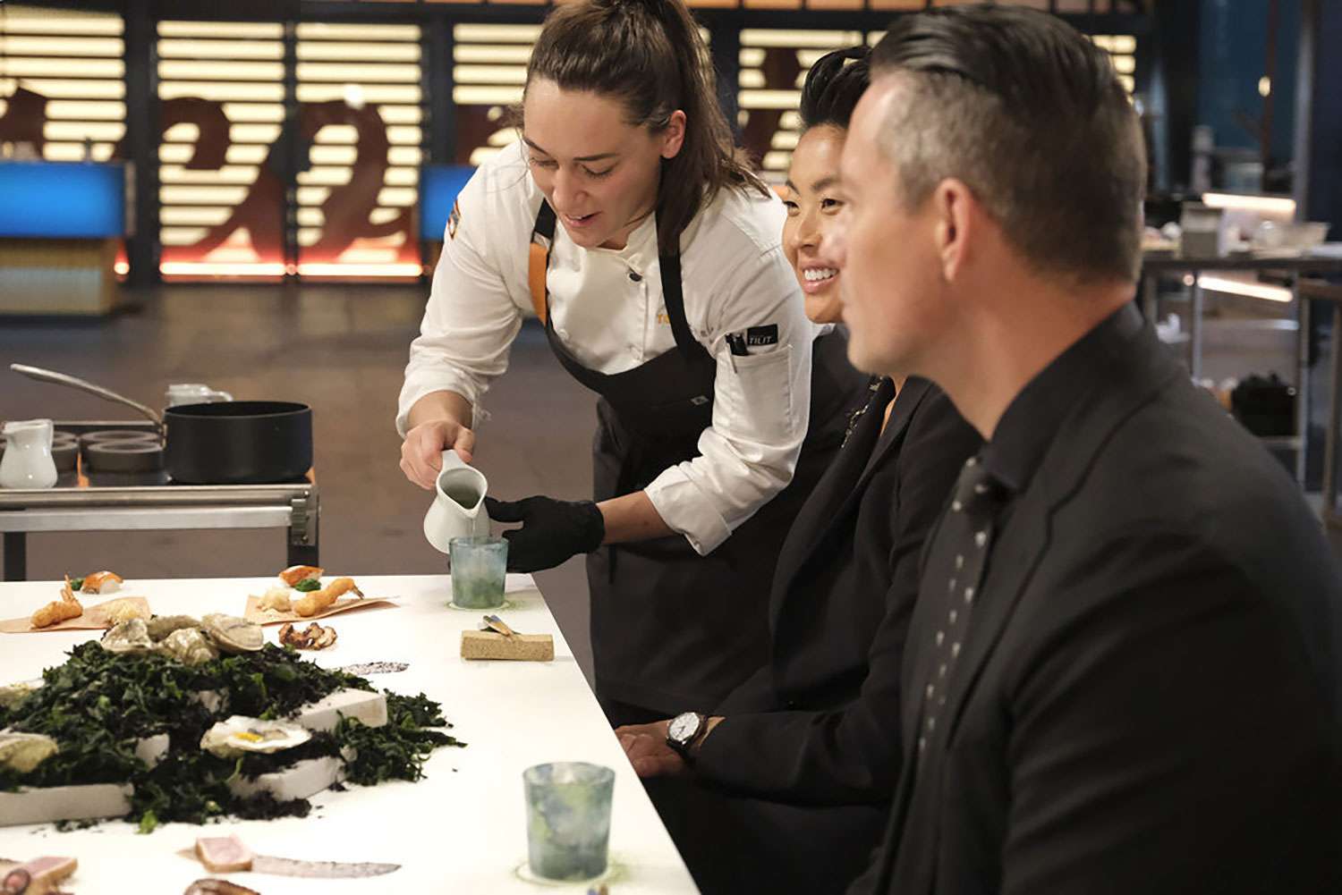 TOP CHEF -- "Lay It All on the Table" Episode 2111 -- Pictured: (l-r) Savannah Miller, Kristen Kish, Curtis Duffy