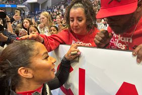  Jordan Chiles is congratulated by her parents Timothy and Gina Chiles after her performance during the 2024 Core Hydration Gymnastics Classic at the XL Centre, Hartford on May 18th, 2024, in Hartford, Connecticut. USA.