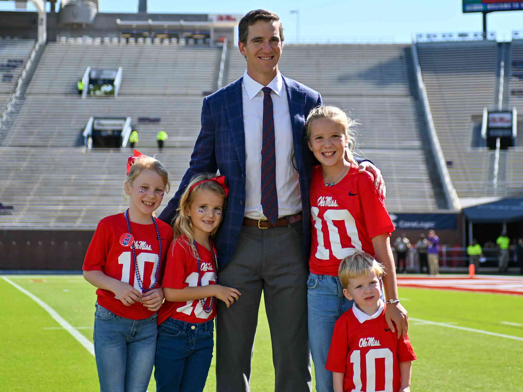 Eli Manning, poses with family members before the college football game between the LSU Tigers and the Ole Miss Rebels on October 23, 2021, at Vaught-Hemingway Stadium in Oxford, MS