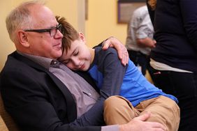 Minnesota DFL(Democratic-Farmer-Labor Party) Governor-elect Tim Walz gave a hug to his son Gus during a birthday party for his daughter Hope