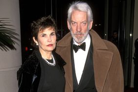 Donald Sutherland and Francine Racette during AFI Lifetime Achievement Award Salute to Dustin Hoffman on February 18, 1999.