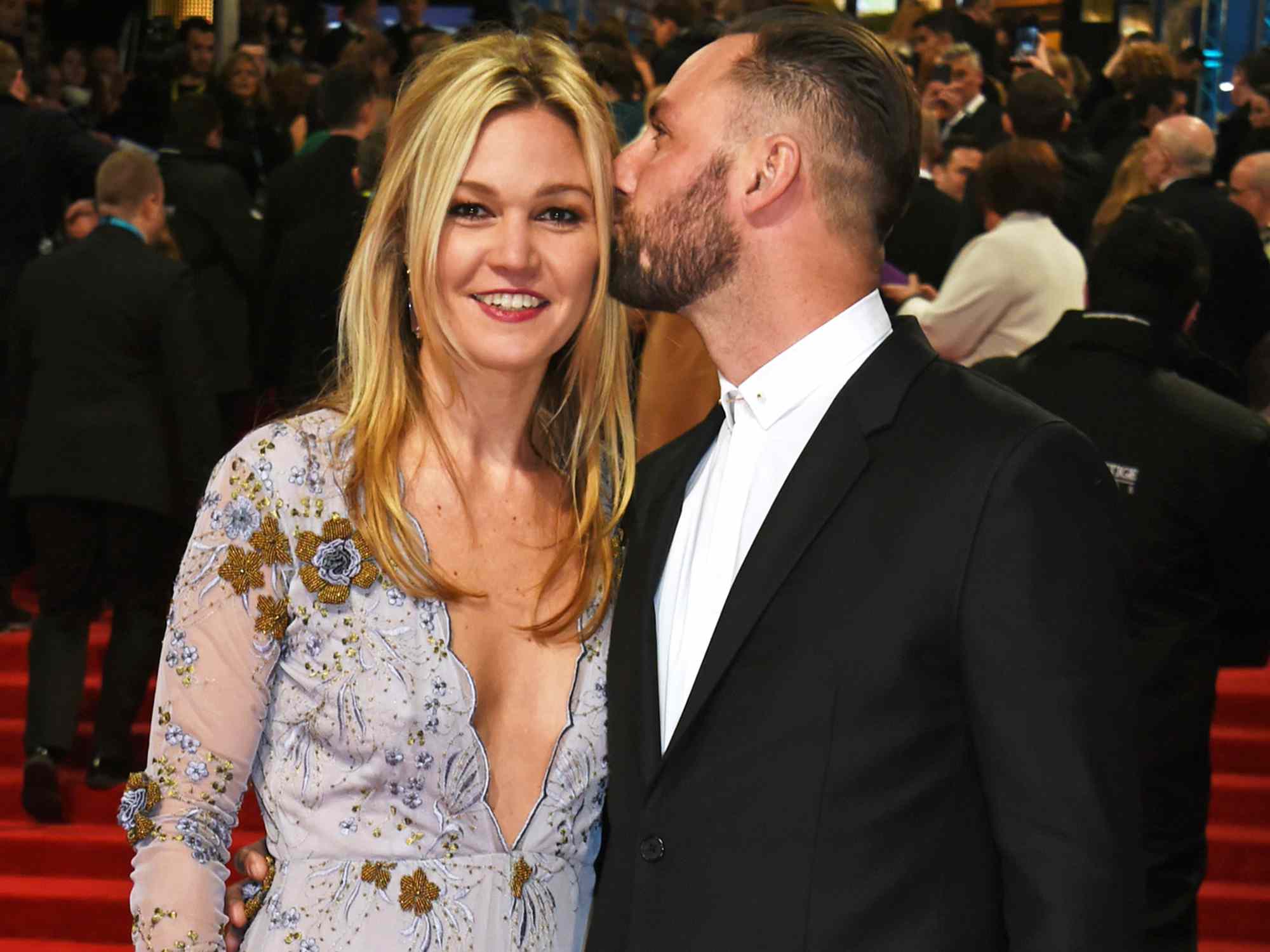 Julia Stiles (L) and Preston J.Cook attend the 70th EE British Academy Film Awards