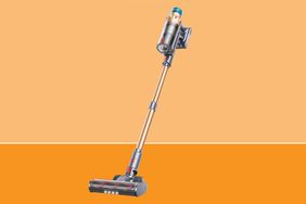 The Smoture Cordless Stick Vacuum on an orange background