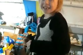 Little girl singing "Let it go" in a shelter