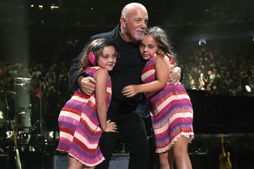 Della Rose Joel, Billy Joel and Remy Joel perform onstage during the last show of Billy Joel's residency at Madison Square Garden