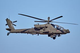 AH 64 Apache - military helicopter performing a demonstration flight.