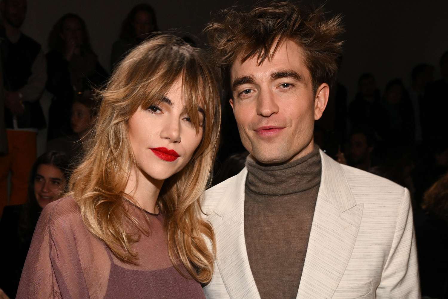 Suki Waterhouse and Robert Pattinson attend the Dior Fall 2023 Menswear Show on December 03, 2022 in Giza, Egypt