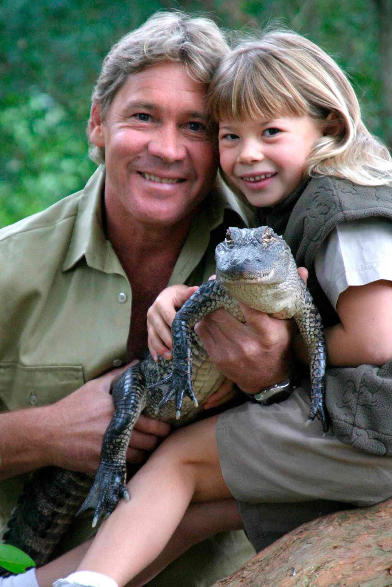 Steve Irwin with his daughter, Bindi Irwin, and a 3-year-old alligator called 'Russ' at Australia Zoo. 