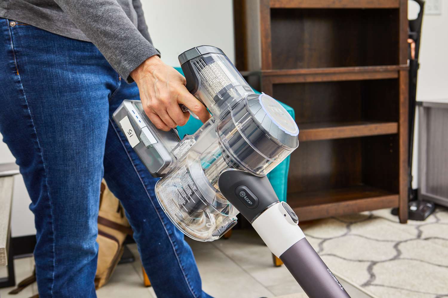 Person holding the Tineco Pure One S11 Smart Stick/Handheld Vacuum