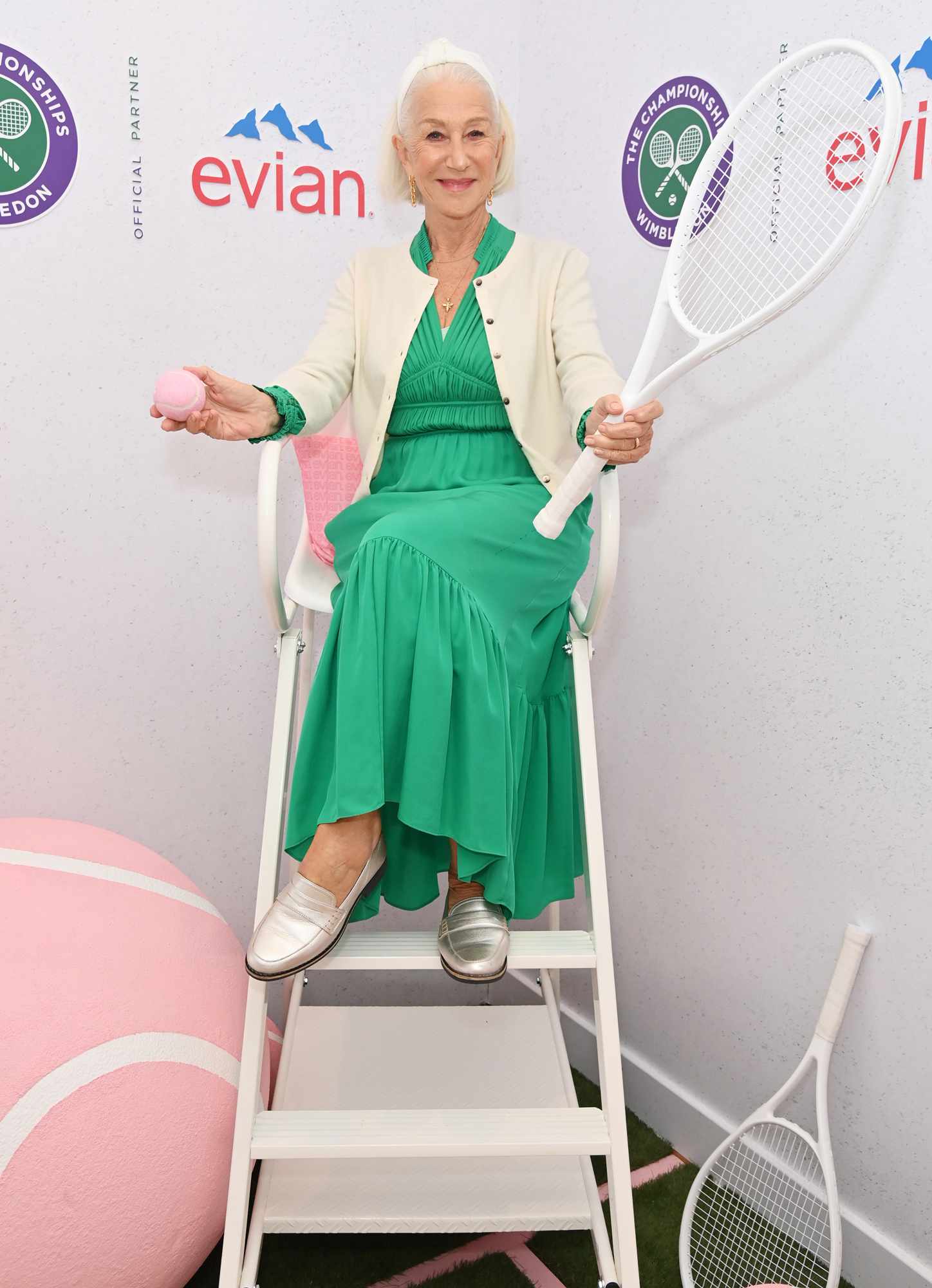 Dame Helen Mirren poses in the evian 'Mountain Of Youth' VIP suite during day 13 of Wimbledon 2024 on July 13, 2024 in London, England.