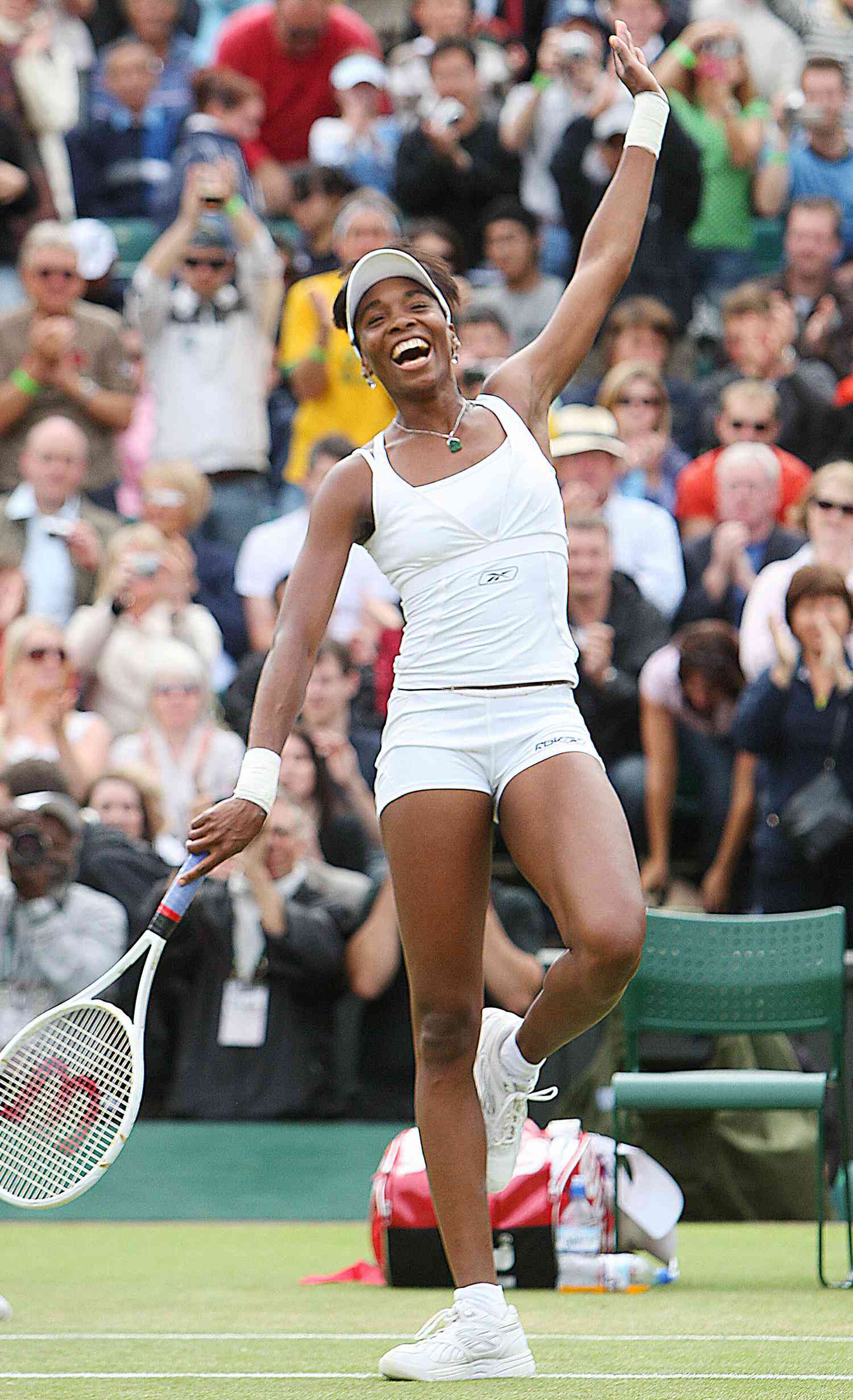 Venus Williams of USA celebrates after defeating Maria Sharapova of Russia during the fourth round of the Wimbledon Tennis Championships in Wimbledon