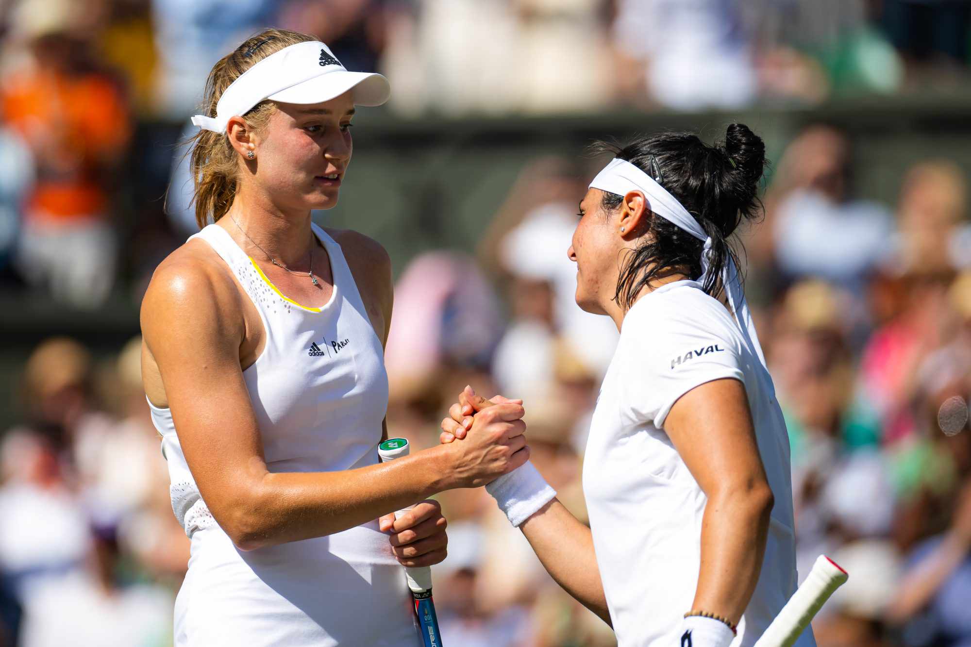 LONDON, ENGLAND - JULY 09: Elena Rybakina of Kazakhstan and Ons Jabeur of Tunisia shake hands at the net after the womens singles final during Day Thirteen of The Championships Wimbledon 2022 at All England Lawn Tennis and Croquet Club on July 09, 2022 in London, England (Photo by Robert Prange/Getty Images)