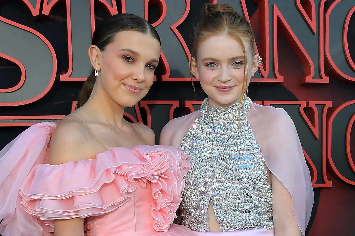 Millie Bobby Brown and Sadie Sink attend the "Stranger Things" Season 3 World Premiere on June 28, 2019 in Santa Monica, California.