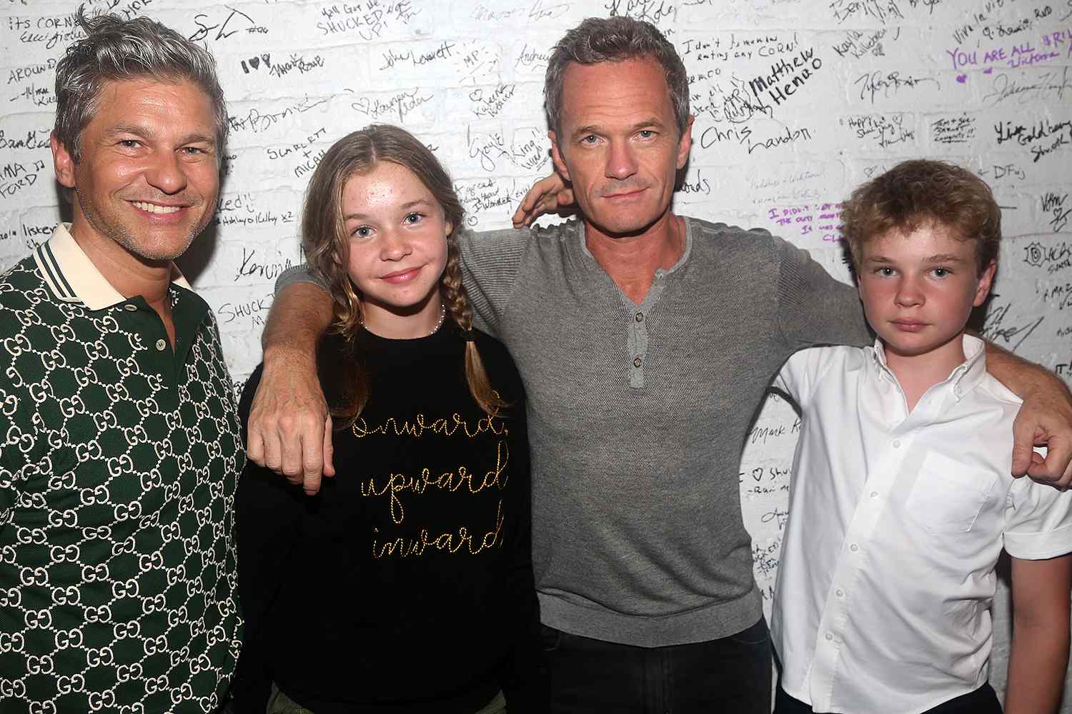 David Burtka, Harper Grace Burtka-Harris, Neil Patrick Harris, Gideon Burtka-Harris pose backstage at the hit musical "Shucked" on Broadway