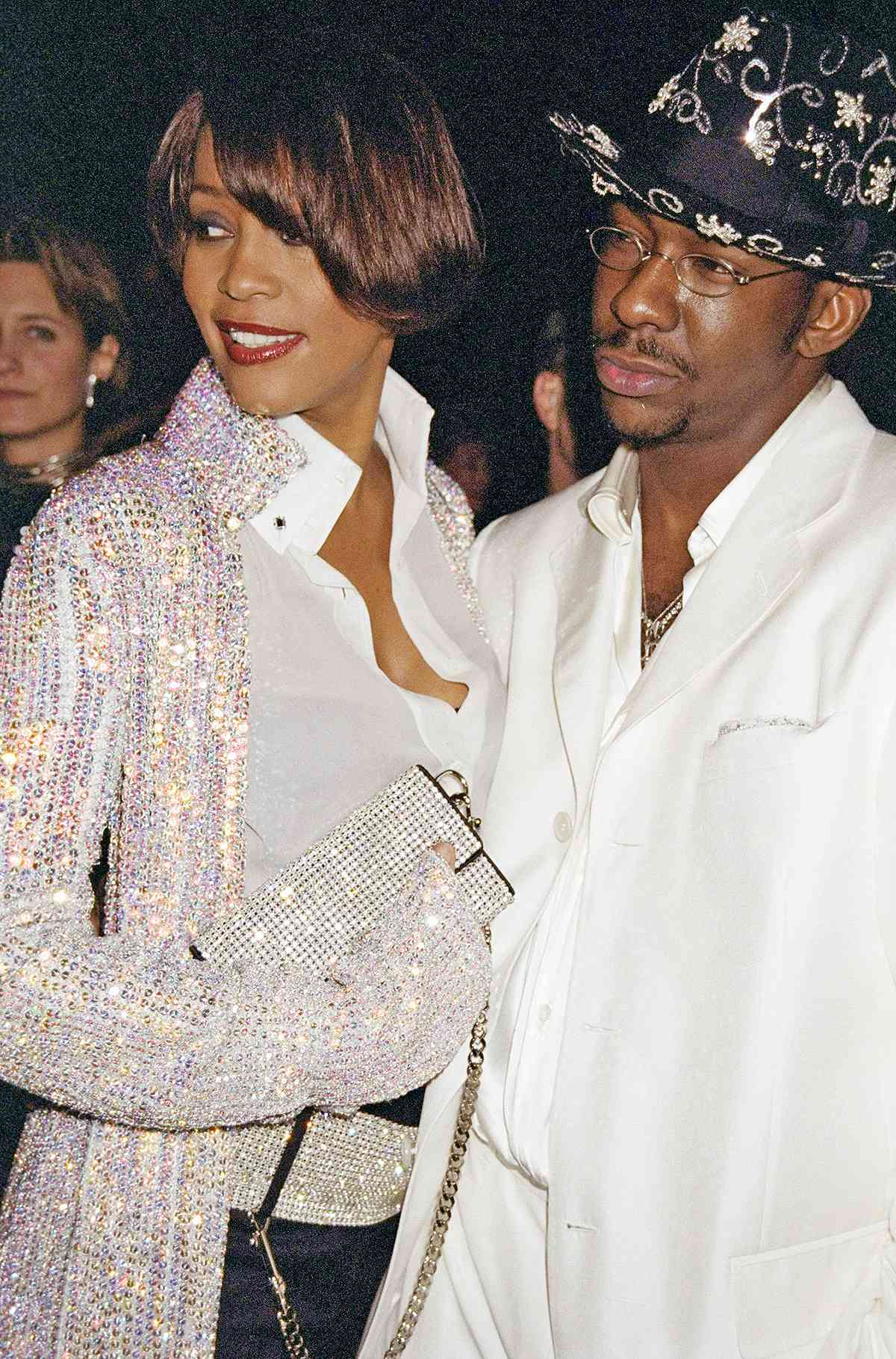 Whitney Houston and husband Bobby Brown are on hand for the