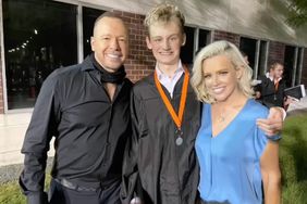 Donnie Wahlberg and Jenny McCarthy with son Evan