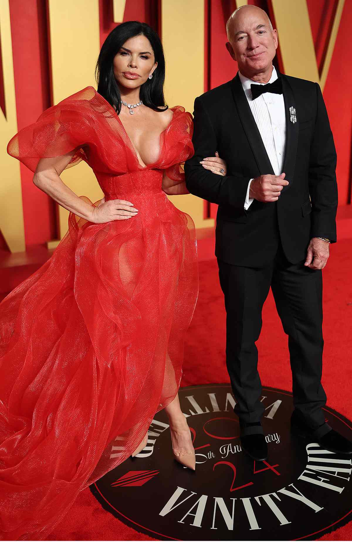 Lauren Sanchez and Jeff Bezos attend the 2024 Vanity Fair Oscar Party