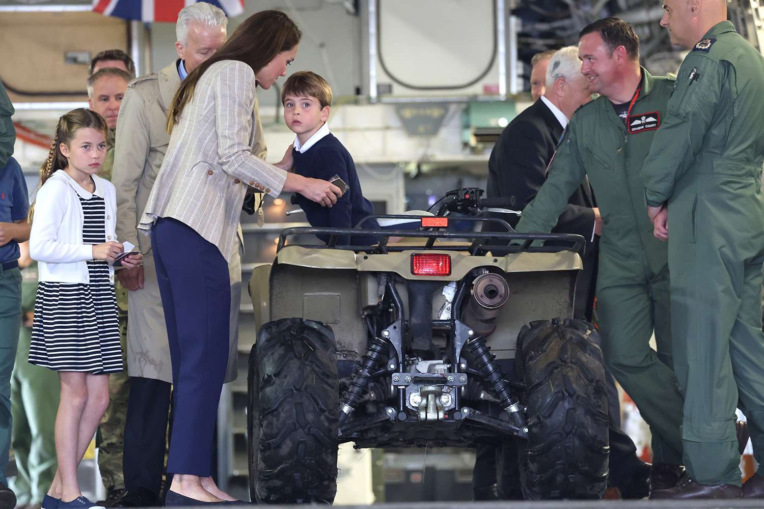 Prince Louis of Wales sits inside a vehicle on a C17 plane during a visit to the Air Tattoo at RAF Fairford with Catherine, Princess of Wales and Princess Charlotte of Wales (L) on July 14, 2023 in Fairford, England