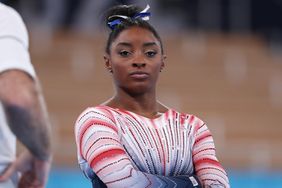 Simone Biles of Team United States reacts before the Women's Balance Beam Final at Ariake Gymnastics Centre on August 03, 2021 in Tokyo, Japan