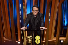 Michael J Fox presents the Best Film Award on stage during the EE BAFTA Film Awards 2024 at The Royal Festival Hall on February 18, 2024 in London, England. 