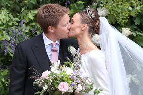 Hugh Grosvenor, Duke of Westminster and Olivia Grosvenor, Duchess of Westminster kiss after their wedding ceremony 