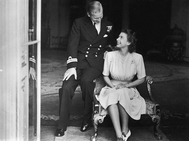 Princess Elizabeth (later Queen Elizabeth II) and her fiance, Philip Mountbatten at Buckingham Palace, after their engagement was announced, 10th July 1947.