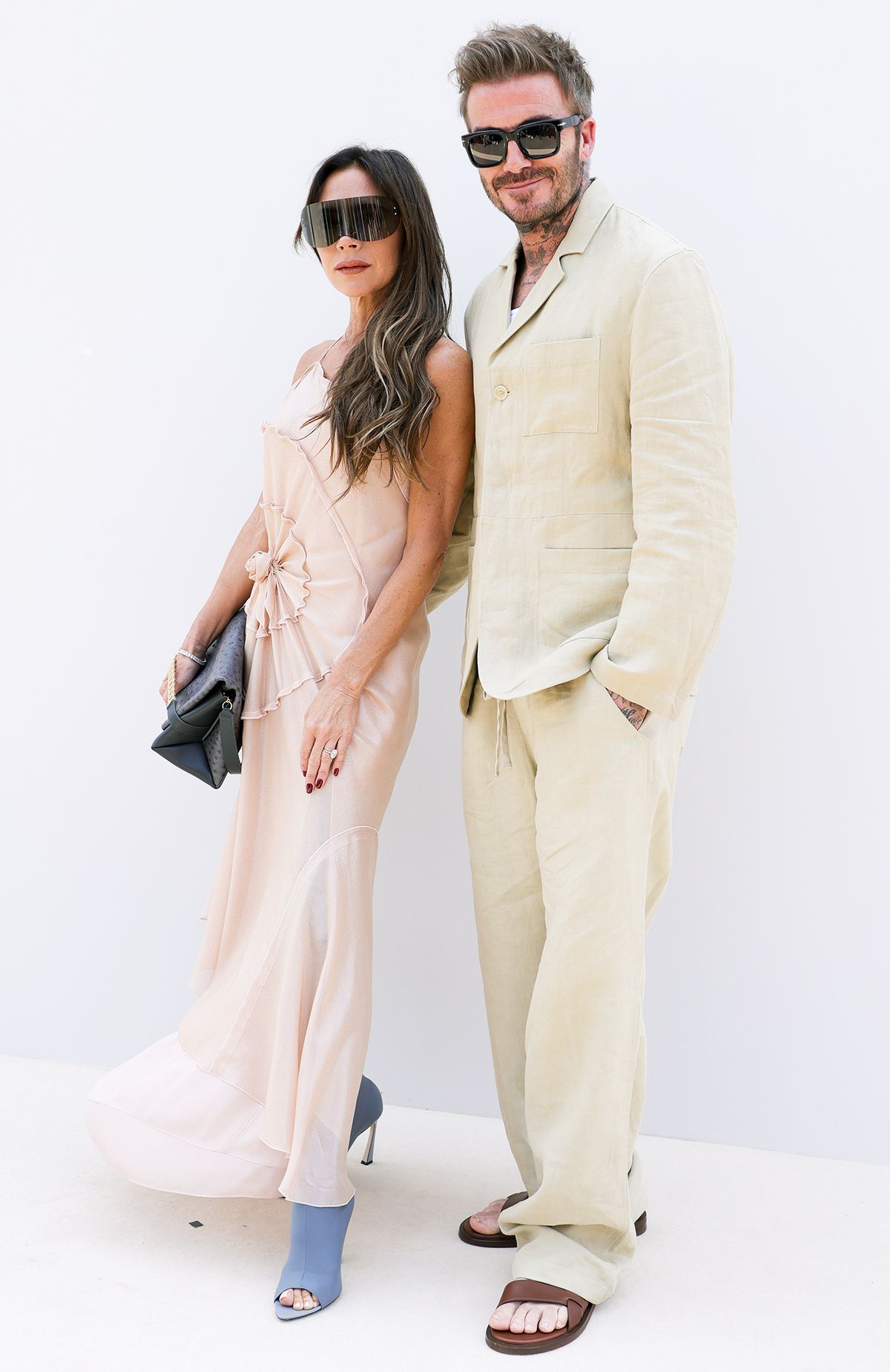 David Beckham and Victoria Beckham attend the "Le Chouchou" Jacquemus' Fashion Show at Chateau de Versailles on June 26, 2023 in Versailles, France.