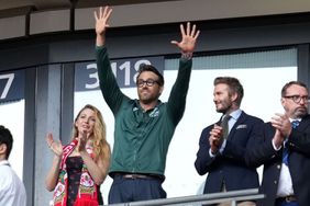 Ryan Reynolds owner of Wrexham FC waves to the fans with David Beckham and Blake Lively Wrexham v Bromley, FA Trophy, Final, Football, Wembley Stadium, London, UK - 22 May 2022