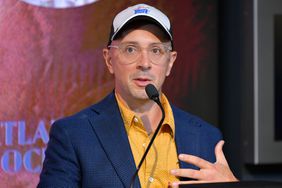 Steve Burns speaks as he and Josh Dela Cruz light the Empire State Building blue in celebration of Blue's Clues 25th Anniversary at The Empire State Building on September 08, 2021 in New York City