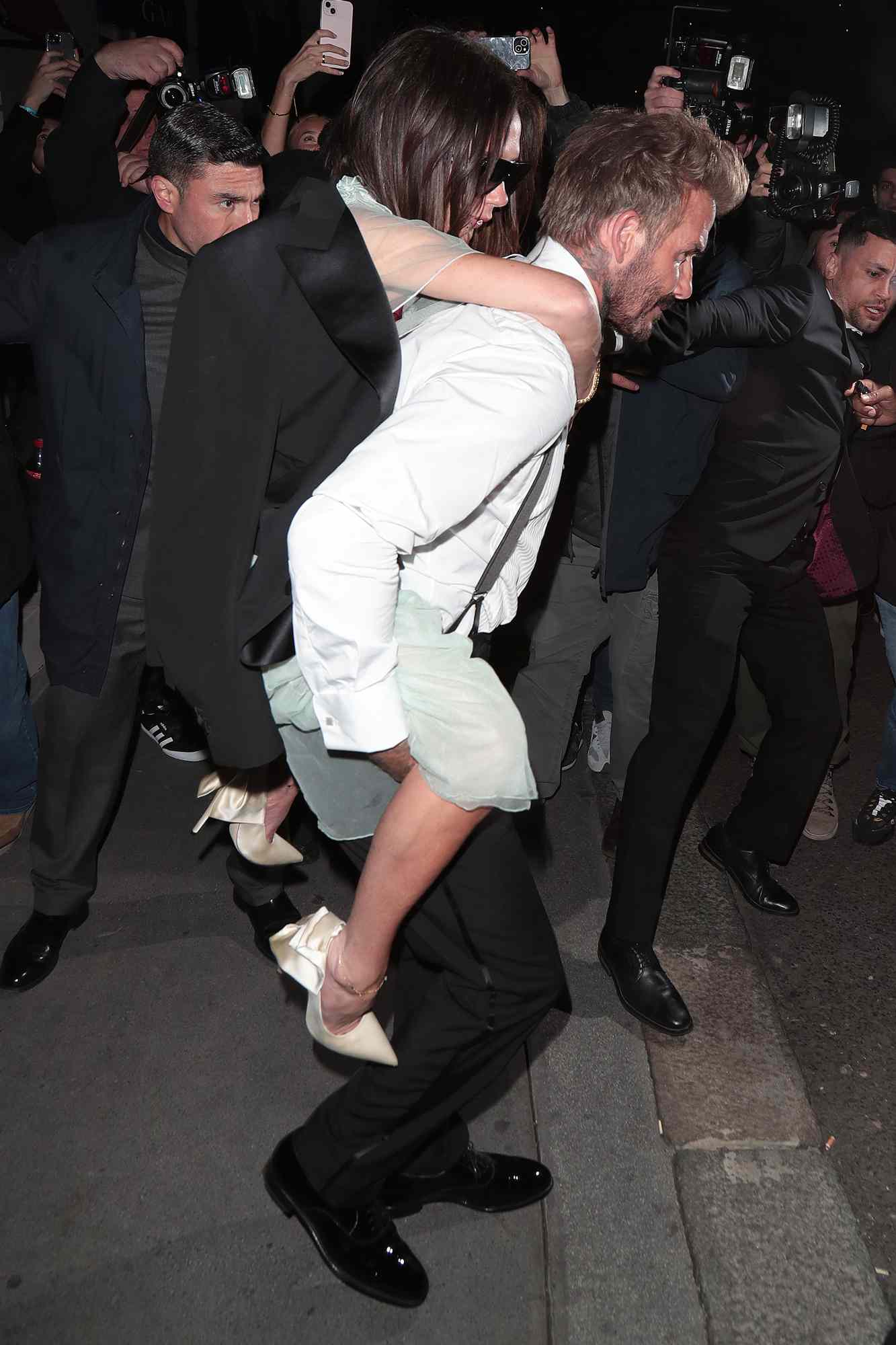 David Beckham and Victoria Beckham are seen leaving Victoria Beckham's 50th Birthday Party at OswaldÃ¢ÂÂs on April 20, 2024 in London, England