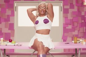 Megan Thee Stallion Channels Regina George in Iconic Bra-Baring Tank Top for New Music Video 