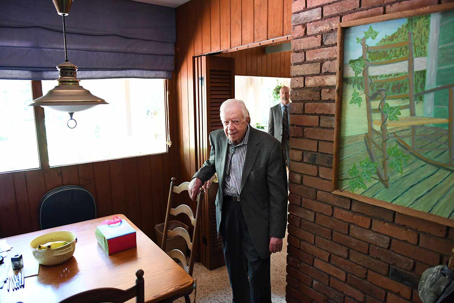 Former President of the United States, Jimmy Carter is seen at his home following a morning church service at Maranatha Baptist Church on Sunday August 05, 2018 in Plains, GA. Born in Plains, GA, President Carter stayed in the town following his presidency. The painting at right was done by Carter. 