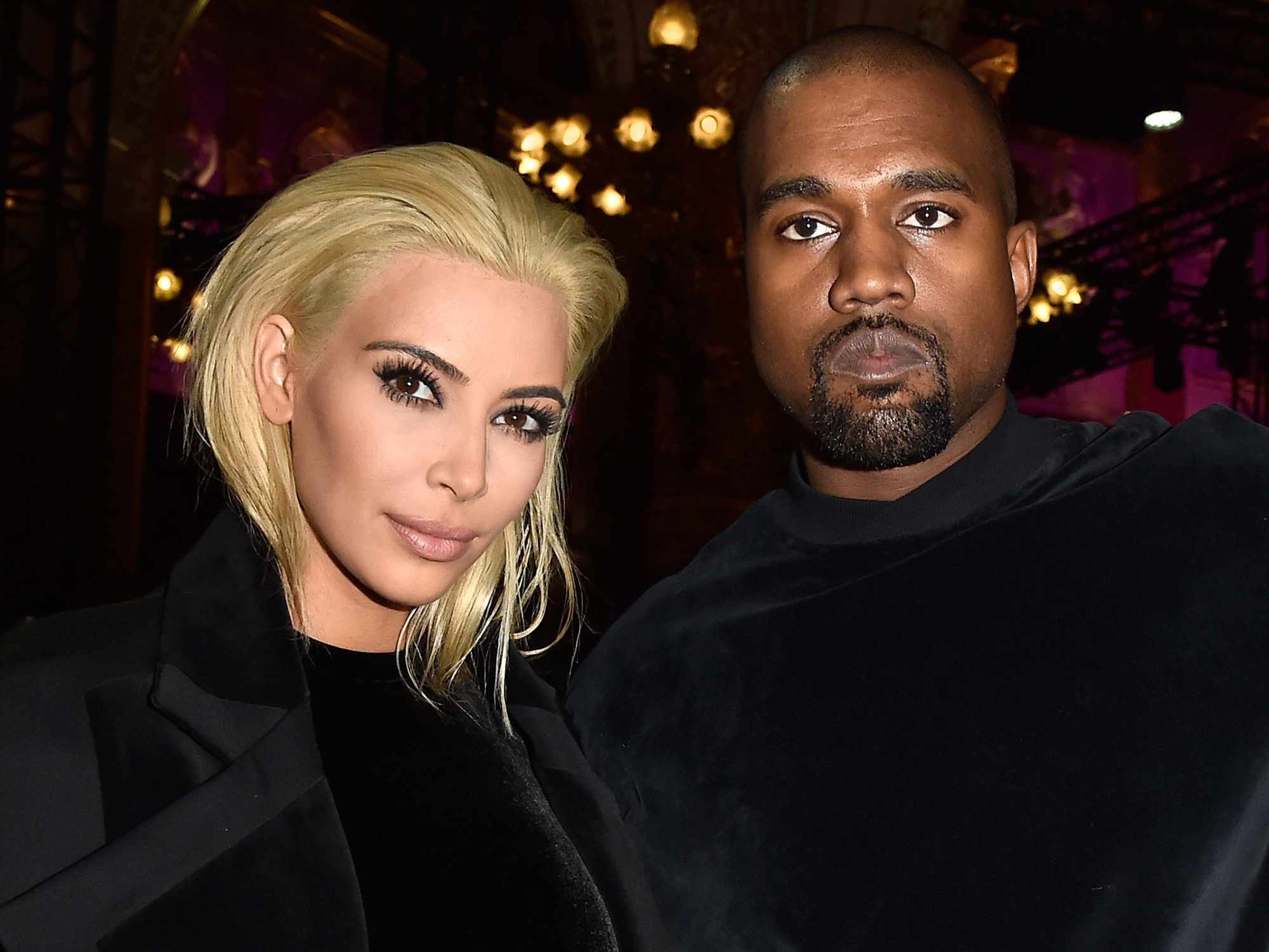 Kim Kardashian and Kanye West attend the Balmain show as part of the Paris Fashion Week Womenswear Fall/Winter 2015/2016 on March 5, 2015 in Paris, France