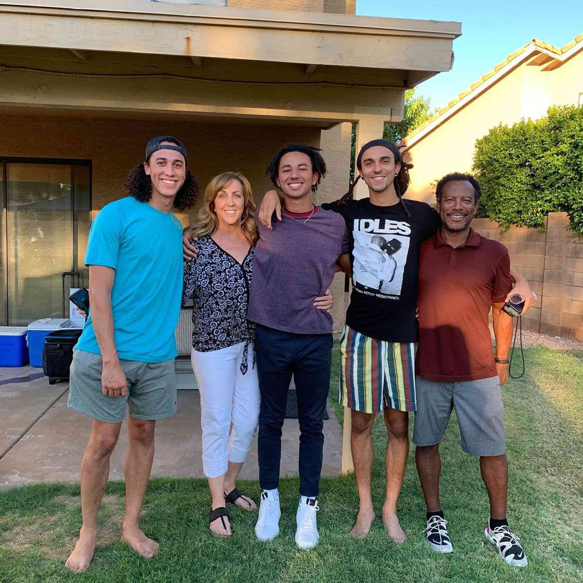 Cole Tucker with his parents, Jackie and Erin Tucker, and his siblings, Carson and Quinn.