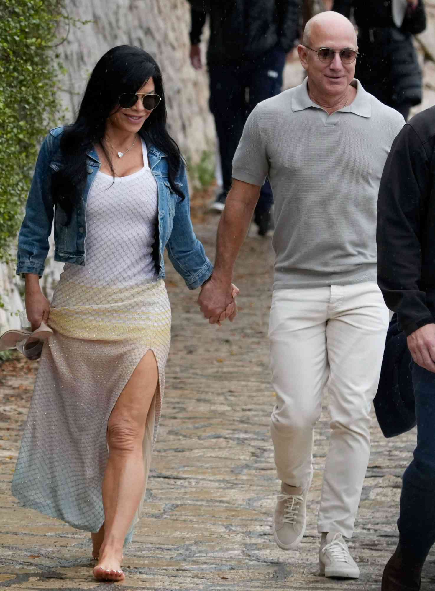 EXCLUSIVE: Jeff Bezos, the Executive Chairman of Amazon, was recently seen enjoying a vacation in the beautiful South of France alongside his girlfriend, Lauren Sanchez. Demonstrating his gallant nature, the billionaire extended his hand to assist Lauren as they disembarked from a boat. Playfully, he gave her a light pat on the backside as they strolled towards their lunch destination. The high-profile couple chose the esteemed Plage Keller restaurant to indulge in a delightful dining experience on May 20, 2023, surrounded by the captivating ambiance of the South of France. Pictured: Jeff Bezos,Lauren Sanchez Ref: SPL7221350 200523 EXCLUSIVE Picture by: AbacaPress / SplashNews.com Splash News and Pictures USA: 310-525-5808 UK: 020 8126 1009 eamteam@shutterstock.com United Arab Emirates Rights, Australia Rights, Bahrain Rights, Canada Rights, Greece Rights, India Rights, Israel Rights, South Korea Rights, New Zealand Rights, Qatar Rights, Saudi Arabia Rights, Singapore Rights, Thailand Rights, Taiwan Rights, United Kingdom Rights, United States of America Rights