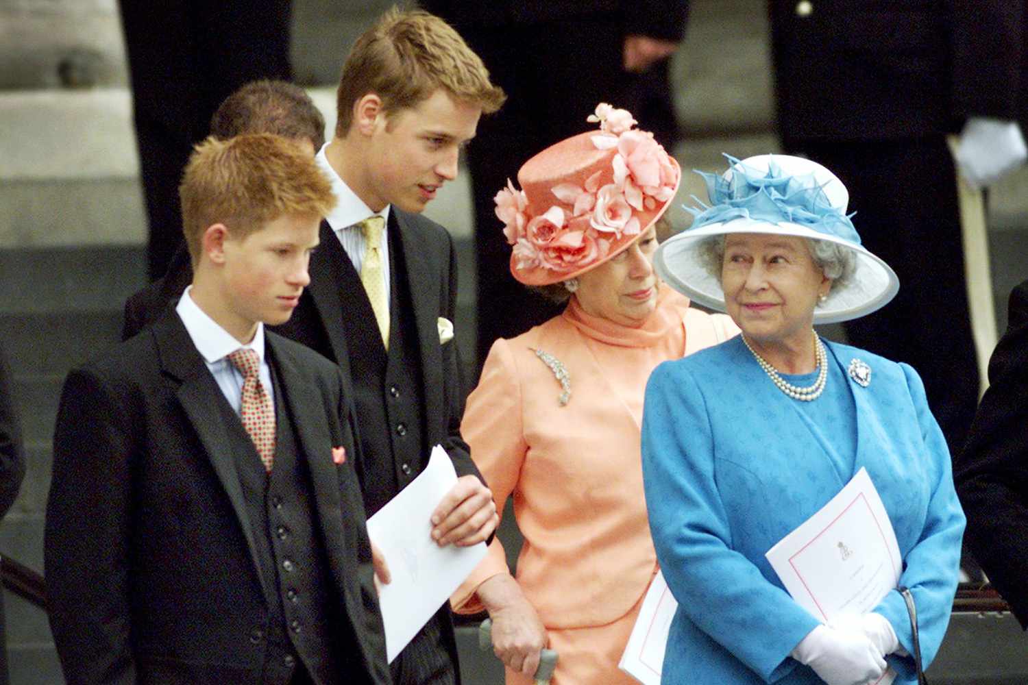 Britain's Queen Elizabeth (R) waits on the steps of St. Paul's Cathedral with her grandsons Prince Harry (L), Prince William (2nd L) and Princess Margaret (2nd R) after attending a national service of thanksgiving in celebration of The Queen Mother's forthcoming 100th birthday in London 11 July 2000