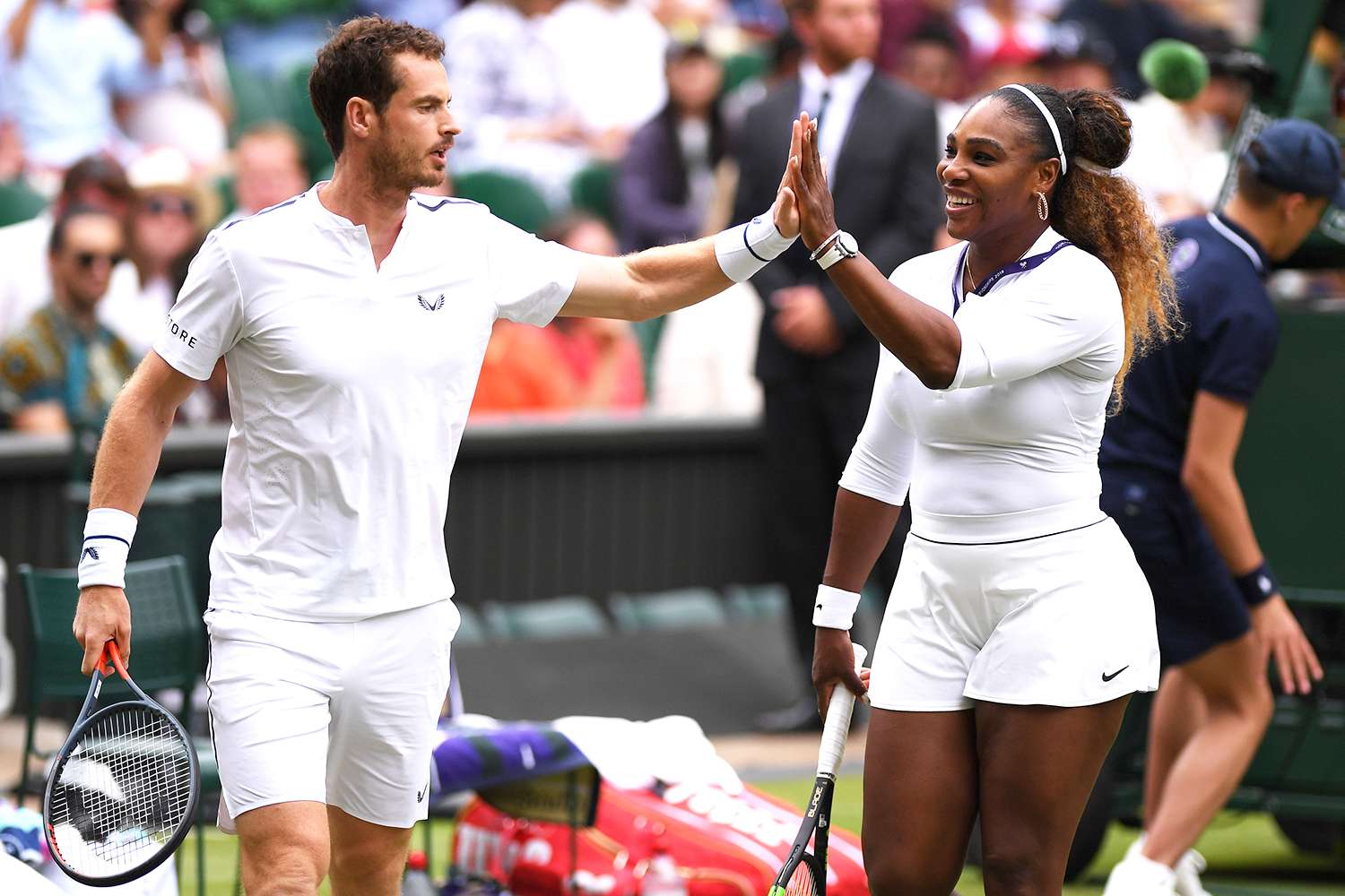 Andy Murray of Great Britain and Serena Williams of The United States react during their Mixed Doubles first round match against Andreas Mies of Germany and Alexa Guarachi of Chile during Day six of The Championships - Wimbledon 2019 at All England Lawn Tennis and Croquet Club on July 06, 2019 in London, England.