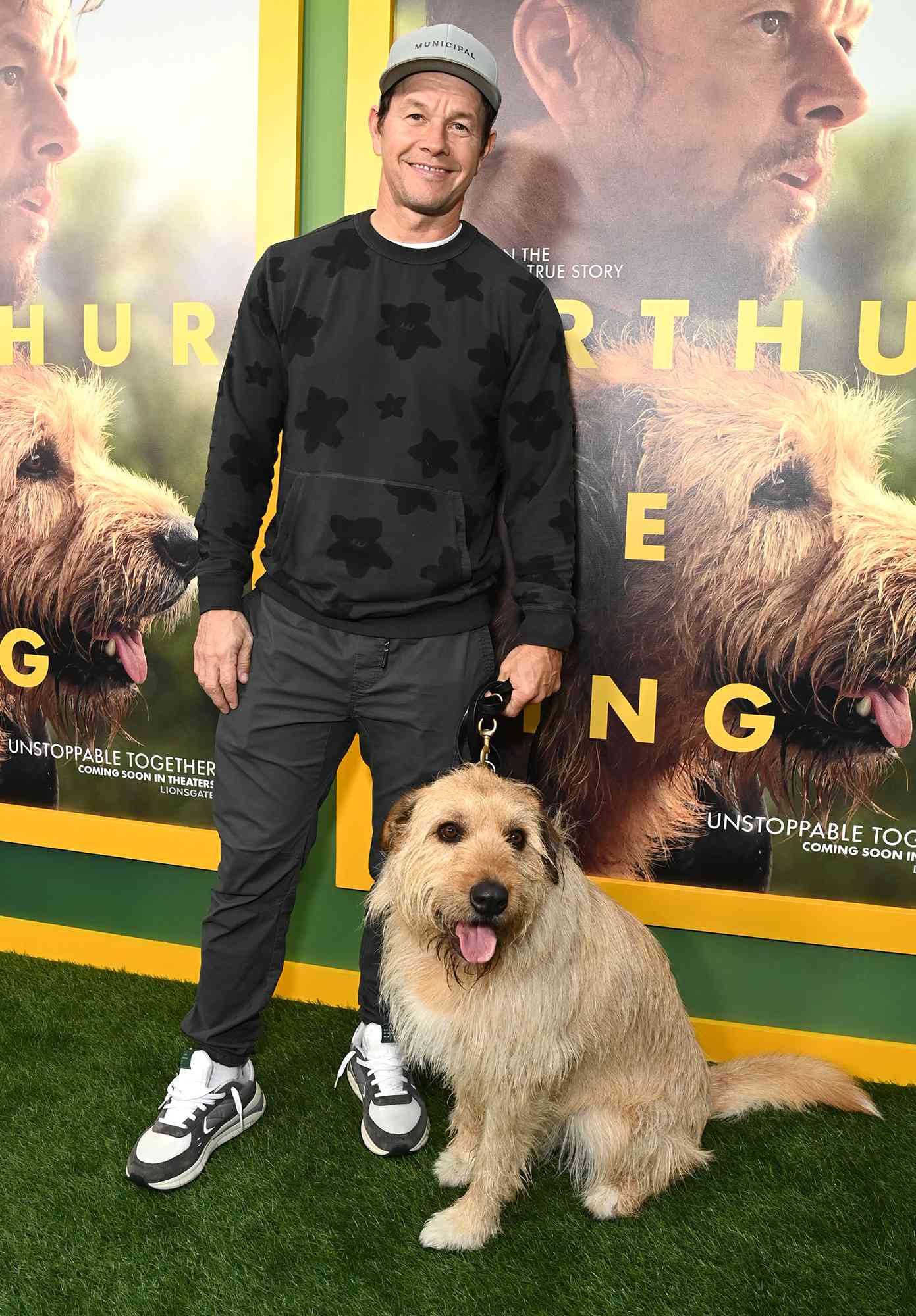 Mark Wahlberg and Ukai attend "Arthur The King" Special Screening And Adoption Event 