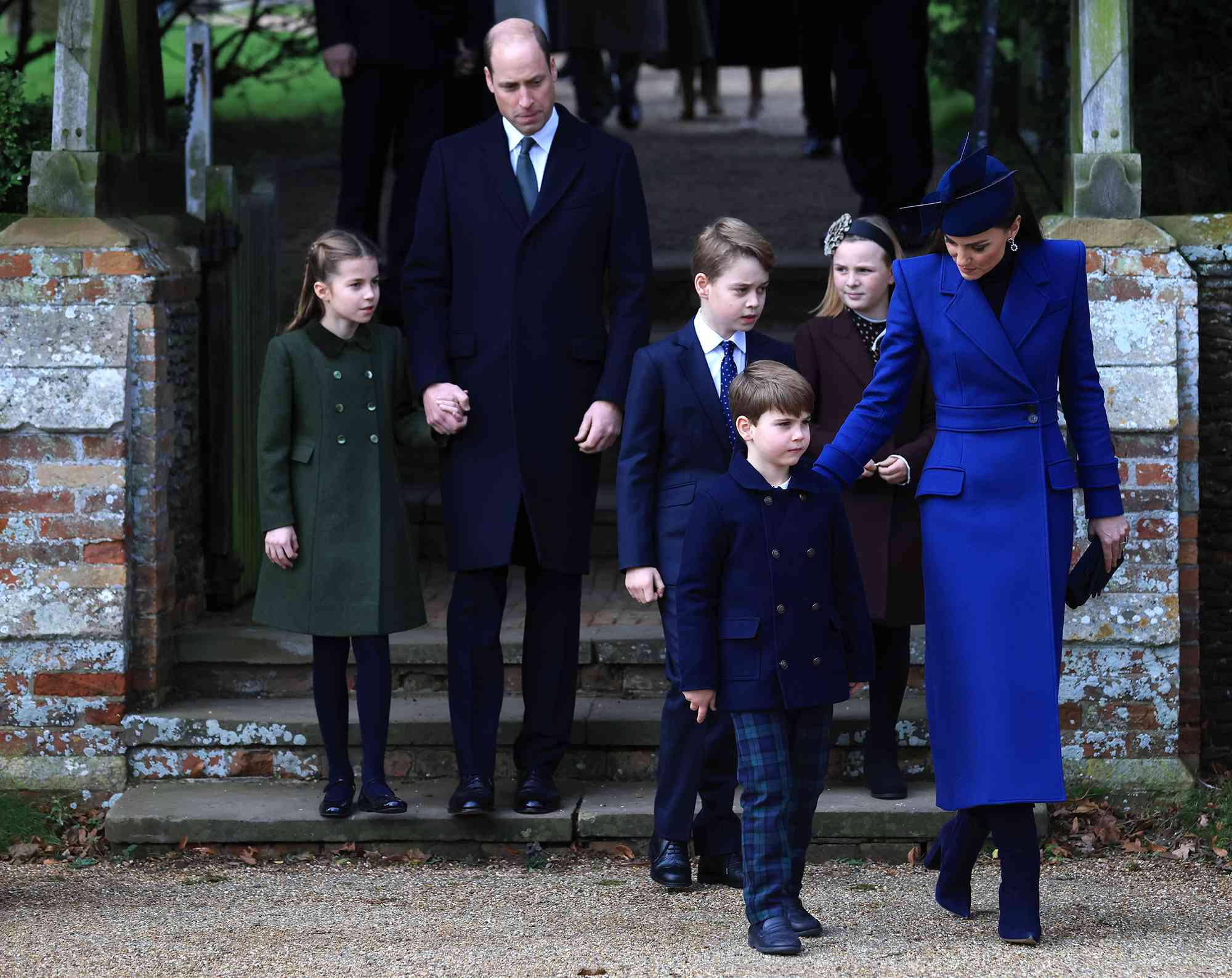 Princess Charlotte, Prince William, Prince of Wales, Prince George, Prince Louis, Mia Tindall and Catherine, Princess of Wales attend the Christmas Morning Service at Sandringham Church