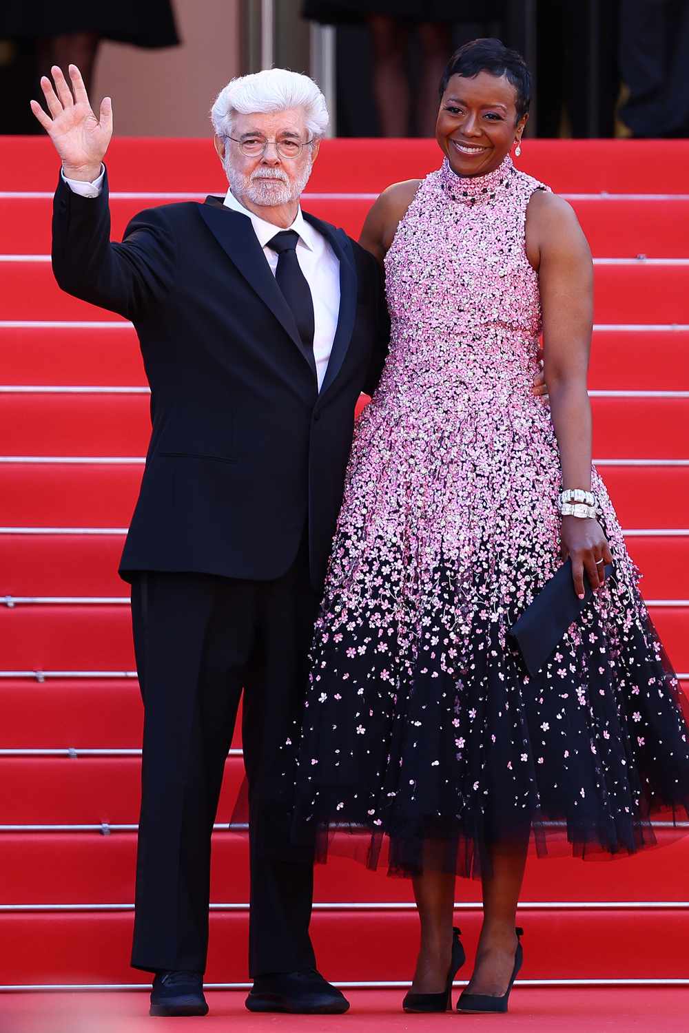 Mellody Hobson and George Lucas attend the Red Carpet of the closing ceremony at the 77th annual Cannes Film 