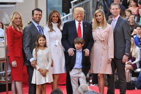 Tiffany Trump, Donald Trump Jr, Kai Trump, Melania Trump, 2016 Republican presidential candidate Donald Trump, Tristan Trump, Ivanka Trump, and Eric Trump pose onstage during NBC's Today Trump Town Hall 