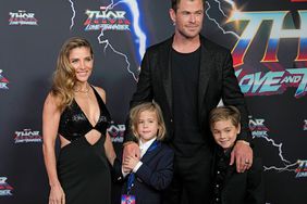 Australian actor Chris Hemsworth and and his wife Elsa Pataky pose for a photo with their twin boy's Tristan and Sasha during a red carpet event for the movie premiere of "Thor: Love and Thunder" at the Entertainment Quarter in Sydney,Australia, Monday, June 27, 2022.