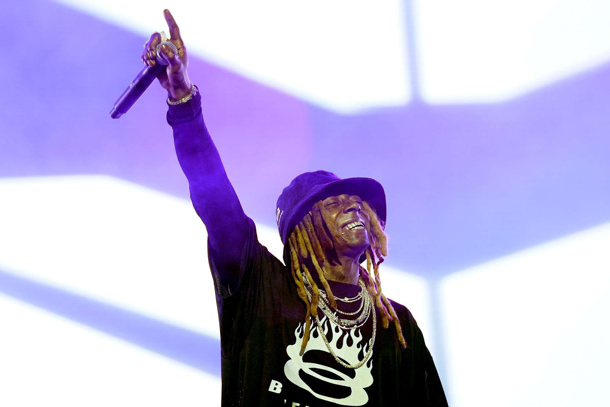  Lil Wayne performs onstage during Day 1 of the 2024 ESSENCE Festival of Culture presented by Coca-Cola at Caesars Superdome on July 05, 2024 in New Orleans, Louisiana. 