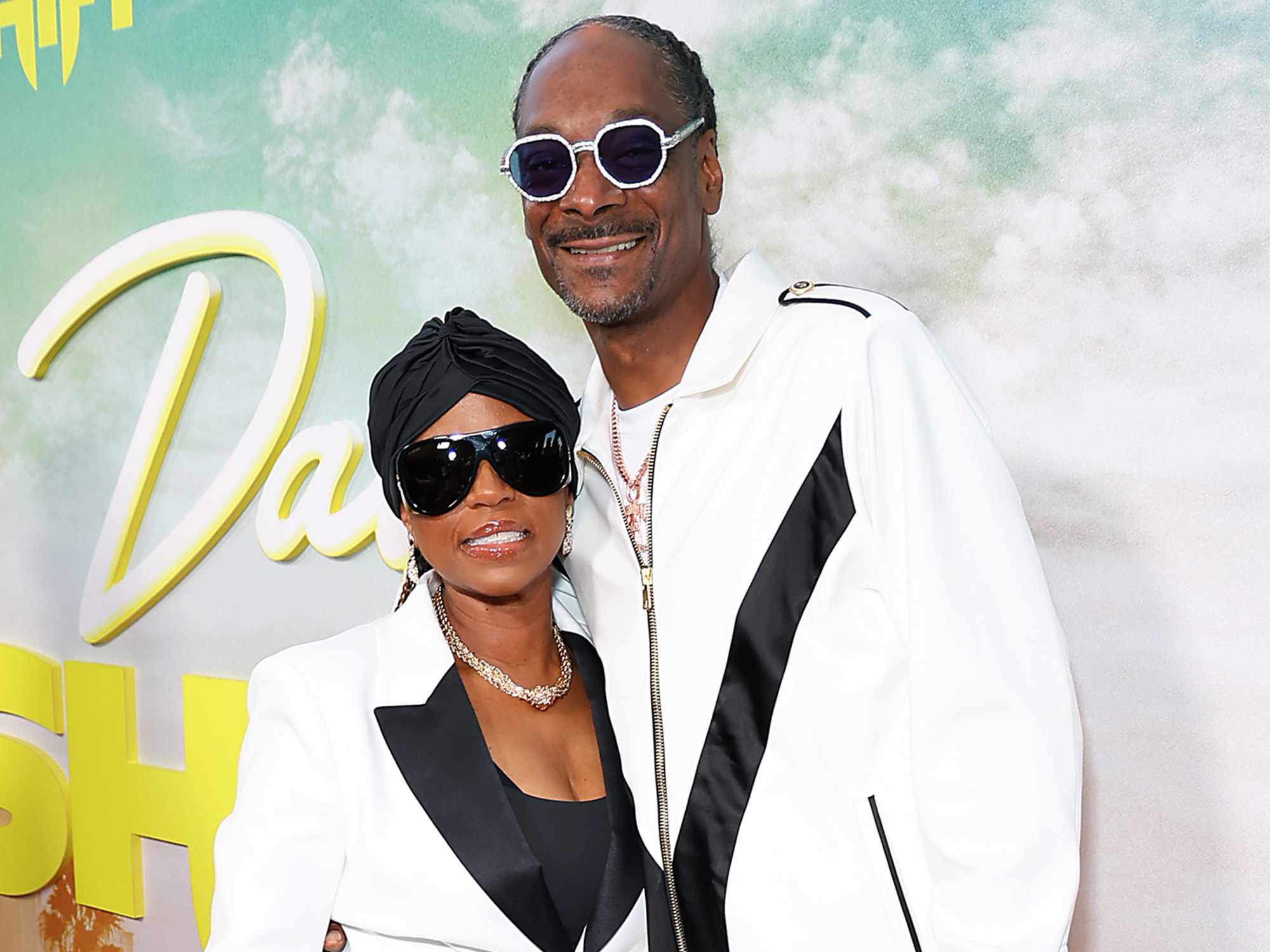 Shante Broadus and Snoop Dogg attend the World Premiere of Netflix's "Day Shift"