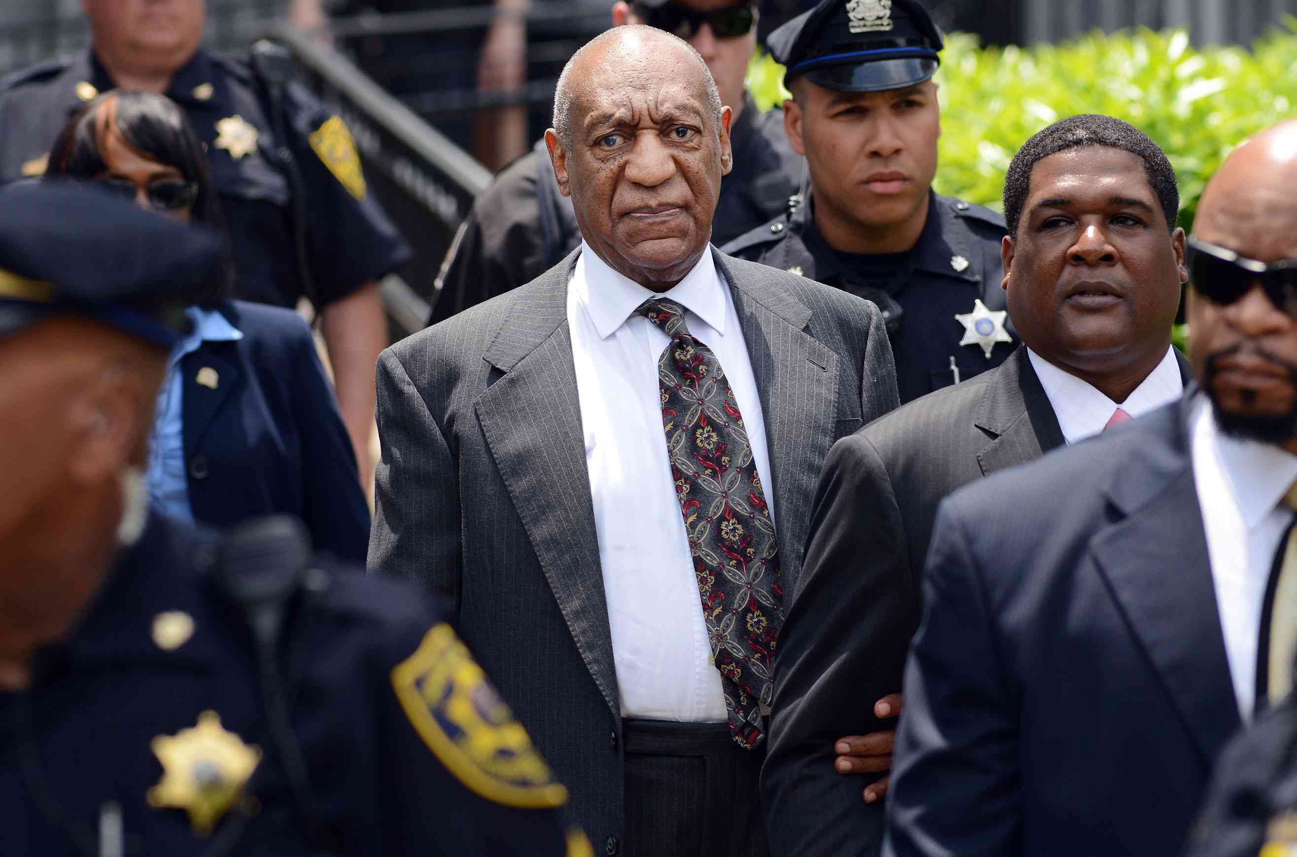 Bill Cosby leaves a preliminary hearing on sexual assault charges