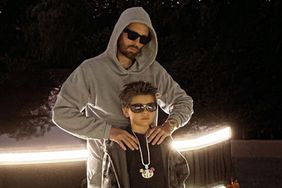 scott disick with son reign and new tesla cybertruck