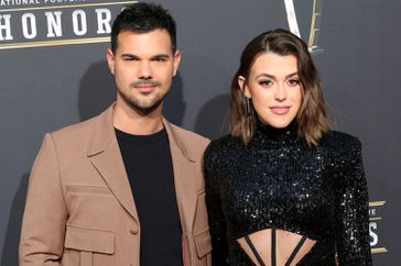 Taylor Lautner and Taylor Dome at the 13th Annual NFL Honors held at Resorts World Theatre on February 8, 2024 in Las Vegas, Nevada.