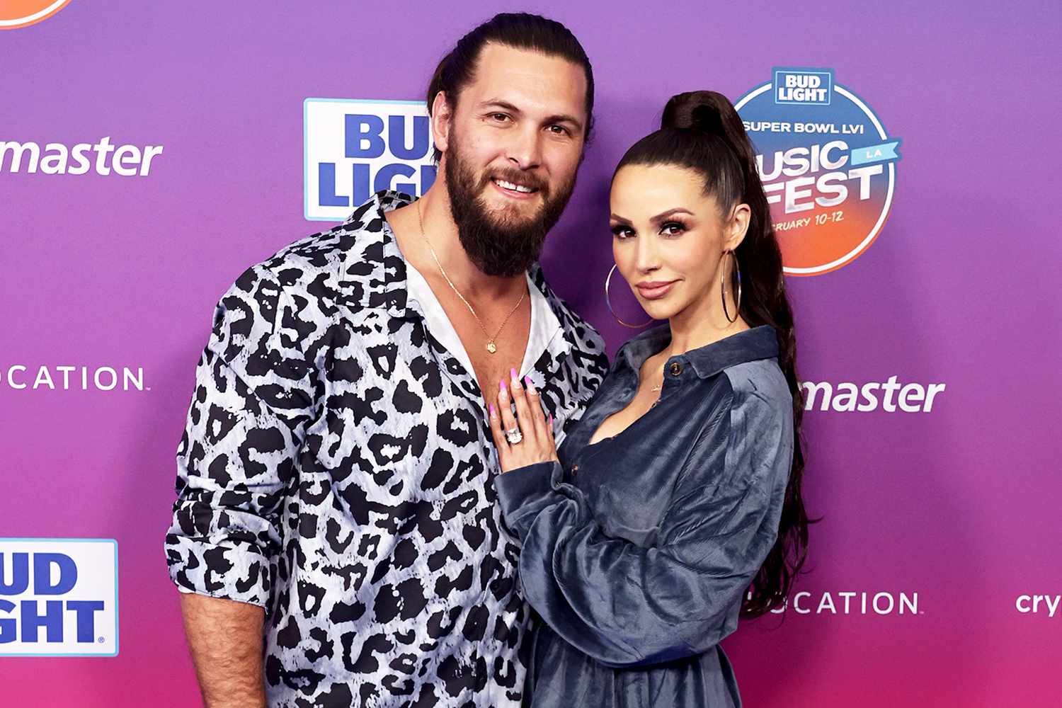 Brock Davies and Scheana Shay attend the 2022 Bud Light Super Bowl Music Fest at Crypto.com Arena on February 12, 2022 in Los Angeles, California.