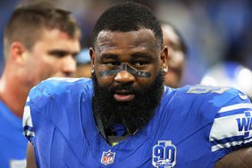 Isaiah Buggs walks off the field after the conclusion of an NFL football game against the Carolina Panthers in Detroit, Michigan USA, on Sunday, October 8, 2023.