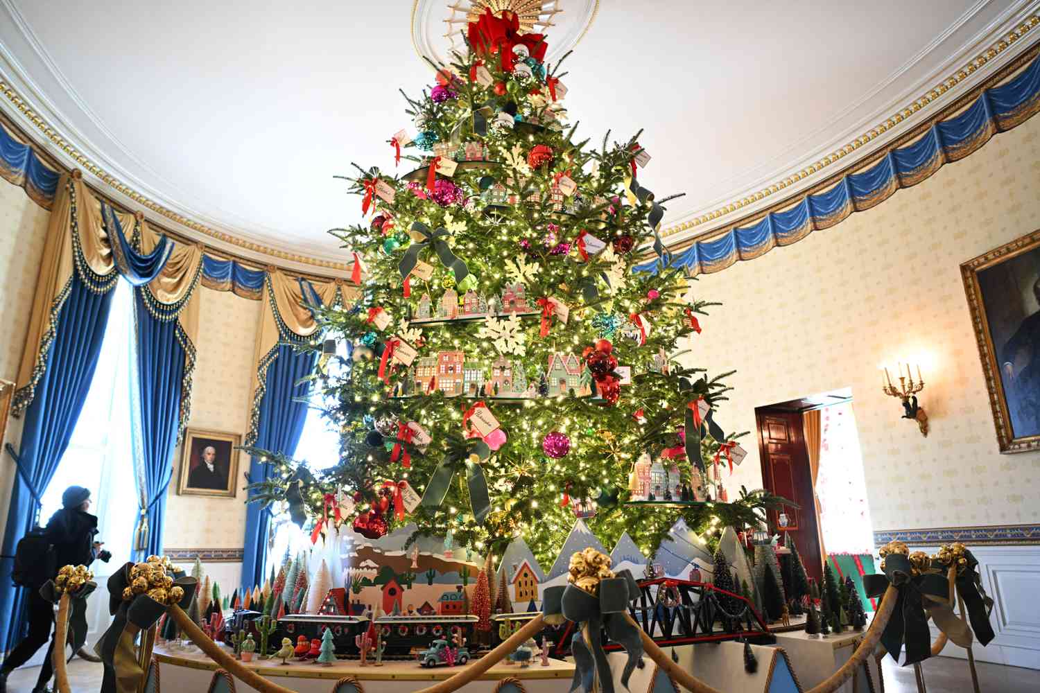 The White House Christmas tree is seen in the Blue Room during the media preview for the 2023 Holidays at the White House in Washington, DC on November 27, 2023